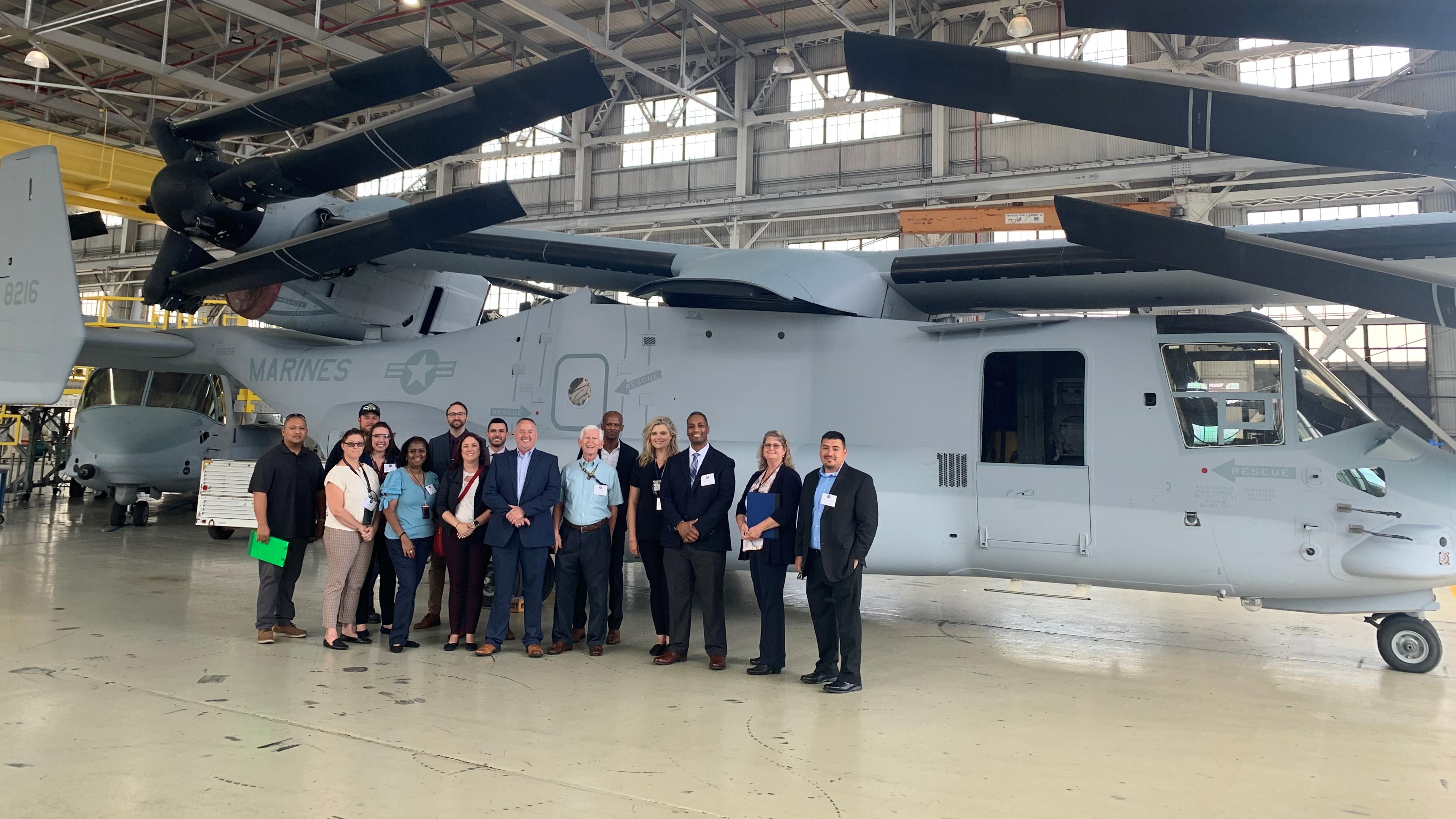 Participants from the NAVAIR Leadership Development Program 2020 cohort shown in the MV-22 Osprey hanger at Fleet Readiness Center Southwest, Naval Air Station North Island