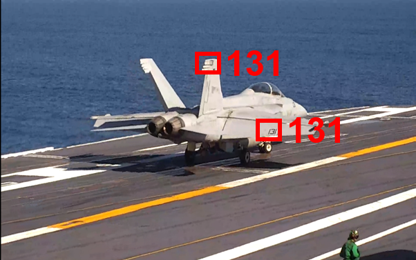 Jet on the deck of an aircraft carrier