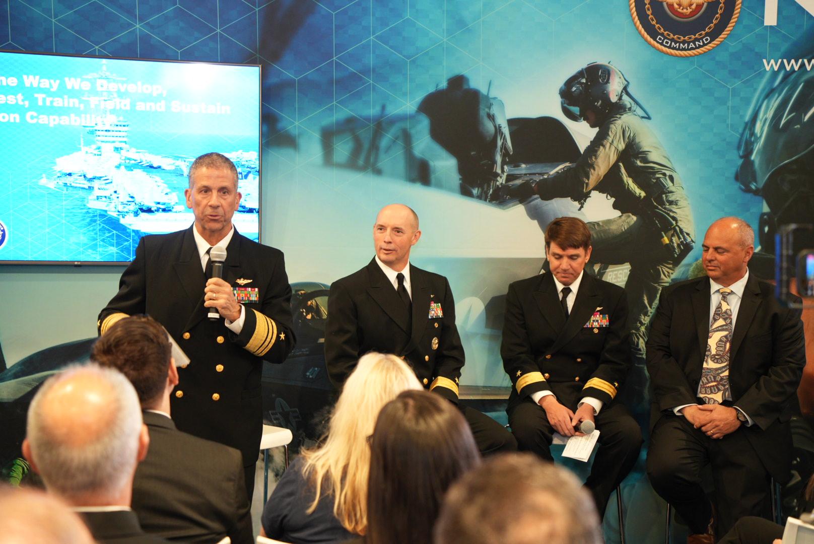 Members of Naval Air Systems Command leadership present the “Advancing the Way We Develop, Integrate, Test, Train, Field and Sustain Naval Aviation Capability" panel at the Sea-Air-Space Expo 2024. From left, NAVAIR Commander Vice Admiral Carl Chebi; Rear Admiral Joe Hornbuckle, Commander, Fleet Readiness Centers; Rear Admiral John Dougherty, Commander, Naval Air Warfare Center Aircraft Division (NAWCAD); and Dan Carreño, executive director of Naval Air Warfare Center Weapons Division (NAWCWD).
