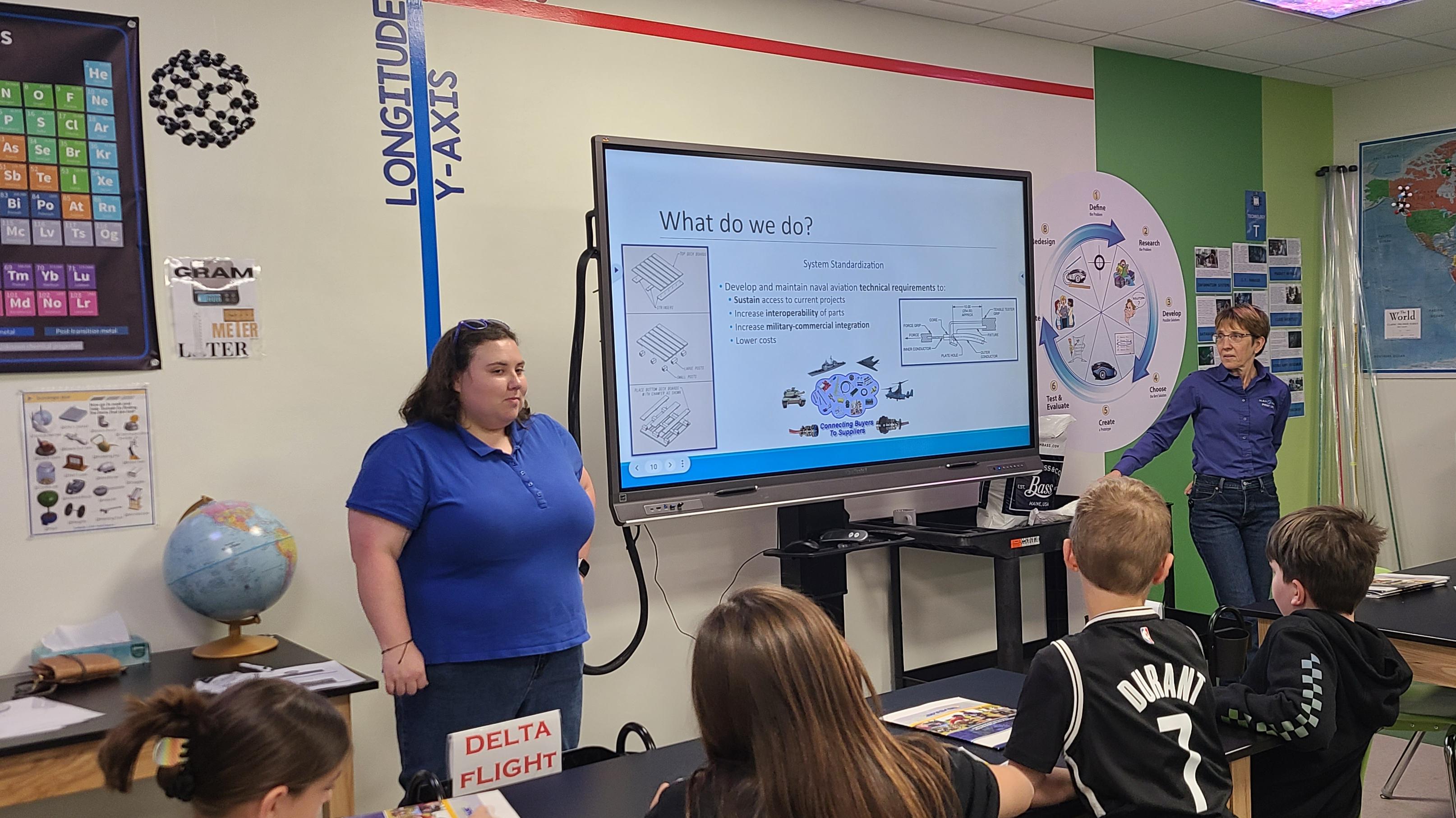 STARBASE volunteers with students