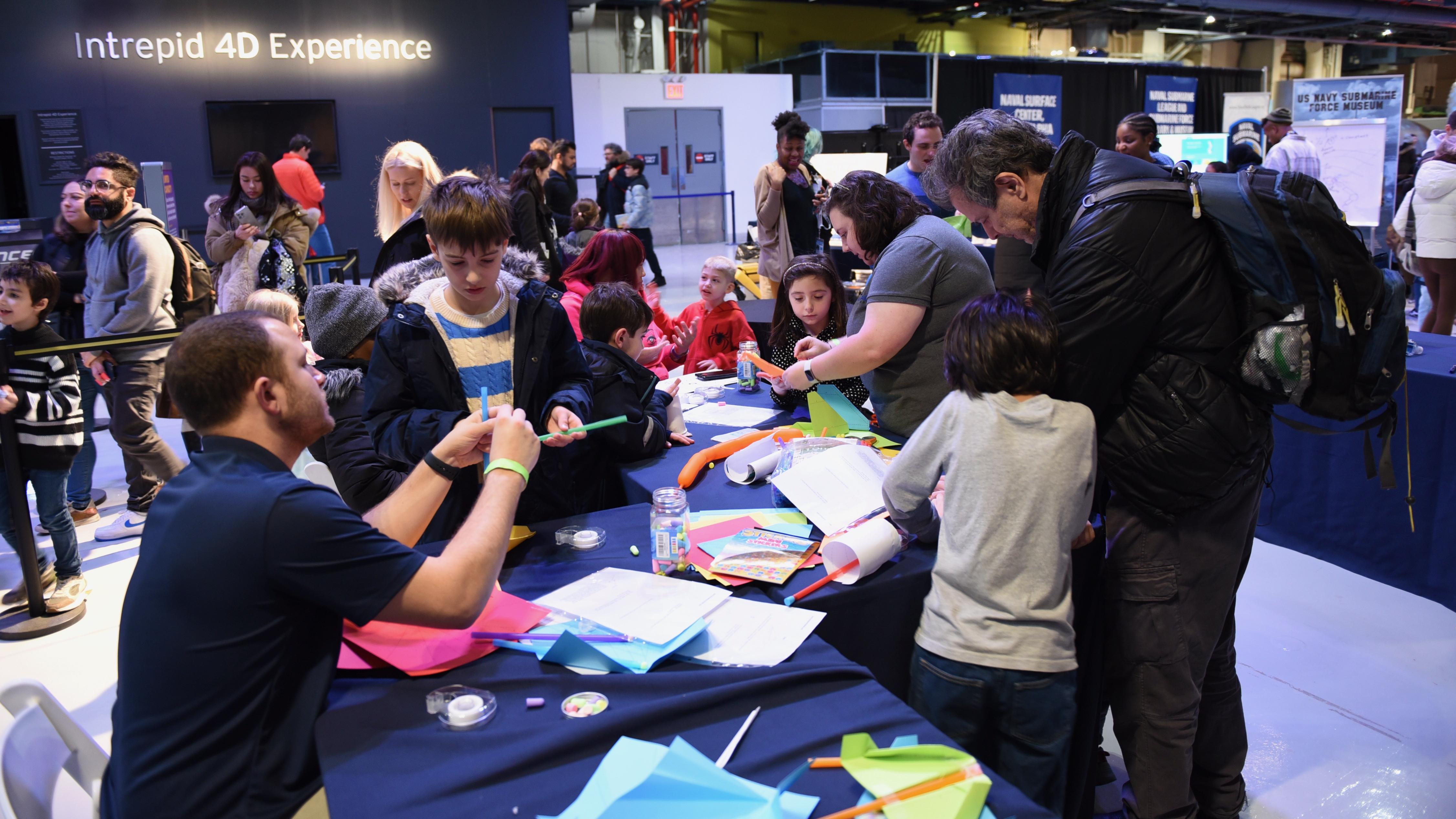 Team Members from Naval Air Warfare Center Aircraft Division Lakehurst take part in Kids Week at the Intrepid Museum