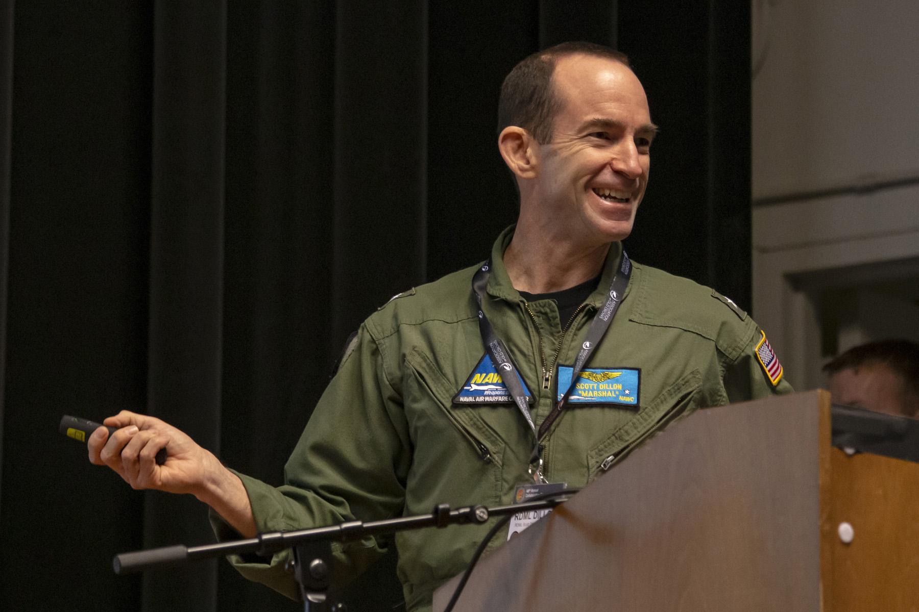 Rear Adm. Scott Dillon speaks during 48th annual EW conference