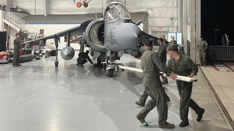 Parking Harrier AV-8B II+ in hangar