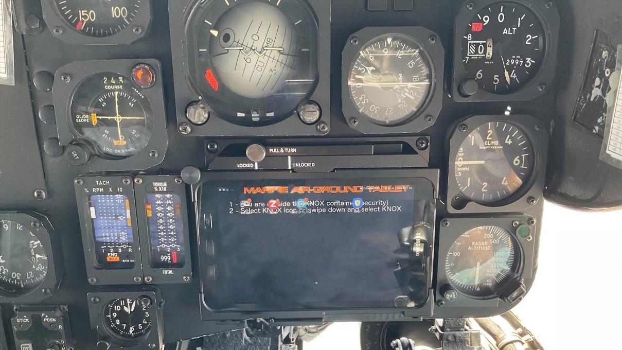 CH-53E cockpit showing dials and a small tablet-size screen