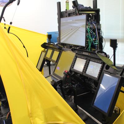 The H-1 Mission Rehearsal Trainer (MRT) on display during a March 14 demonstration at NAVAIR headquarters. The new simulator provides on-site mission rehearsal training, increasing opportunities for pilots to maintain combat skills while deployed. (U.S. Navy Photo)