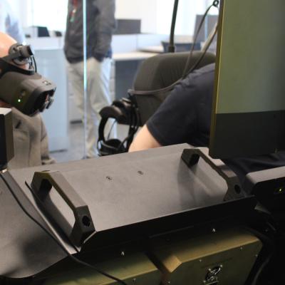 During a recent demonstration, Mr. Gary Kurtz, Program Executive Officer for Air Anti-Submarine Warfare, Assault, and Special Mission Programs (PEO (A)), had the opportunity to “fly” the new H-1 Mission Rehearsal Trainer (MRT). The simulator provides on-site a mission rehearsal training, increasing opportunities for pilots to maintain combat skills while deployed. (U.S. Navy Photo)