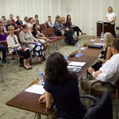 Trish Gresham runs a panel discussion with Doris Kelly, Frank Graham, Merrie Giles, Collin Kyte and Lily Gonzalez on Aug. 27 at China Lake in honor of Women’s Equality Day. (U.S. Navy photo by Paul Kakert)