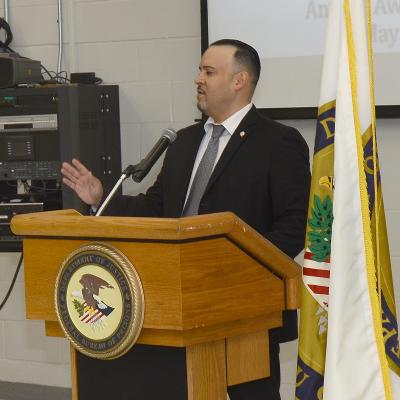 WILDWOOD, Fla. (May 10, 2019) Central Florida Federal Executive Association Outgoing Executive Director (acting) David Cruz served as Master of Ceremonies during first-ever Federal Employee of the Year Awards Ceremony.  Cruz, who is a Financial Management Analyst at the Naval Air Warfare Center Training Systems Division, completed a one-year assignment as the FEA-CFL acting executive director, and turned over the role to Maureen Fox from the U.S. Army Contracting Command Orlando.