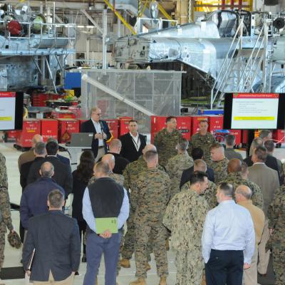 Boots on the Ground attendees in H-53 hangar