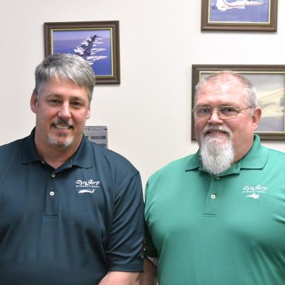 DynCorp quality assurance manager Keith Humphreys, left, and senior maintenance controller Roy Stolle spent two months ensuring that their aircraft and facilities were ready for the 2020 Aviation Maintenance Inspection.