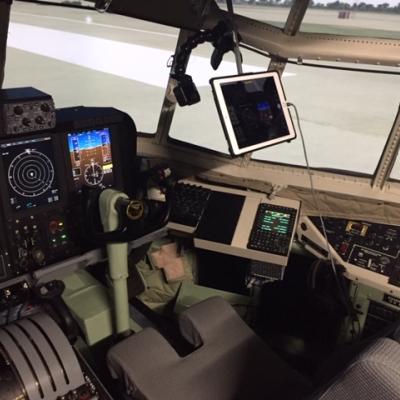 A GoPro camera installed in the cockpit of the C-130T Avionics Obsolescence Upgrade Operational Flight Trainer at Naval Air Station Fort Worth Joint Reserve Base allowed teams in four separate locations around the country to observe a software test while adhering to COVID-19 restrictions. (U.S. Navy photo by Mark J. VanMinsel)