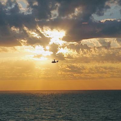 An MV-22 Osprey flies near the USS Wasp (LHD 1) as part of a series of flight tests conducted by a detachment of military and civilian personnel from Air Test and Evaluation Squadron (HX) 21 to validate a new flight control capability for MV-22s operating from ships. (U.S. Navy photo by Pat Murphy)