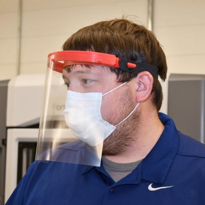 Man wears face shield