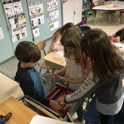 Students gather supplies