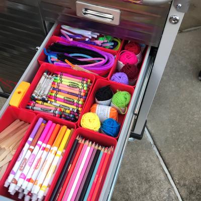 School supplies in cart drawer