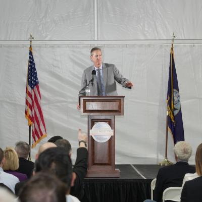 DASN (RDT&E) Dr. Brett Seidle gestures while speaking at the 2022 NISE TEM
