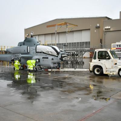 Transportation crew prepares to move H-1 aircraft