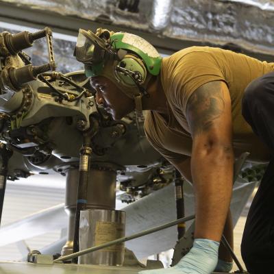 Maintainer on a MH-60S Seahawk