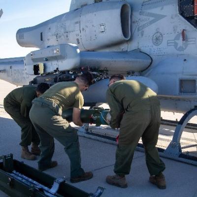 USMC VMX-1 load JAGM onto a AH-1Z Viper
