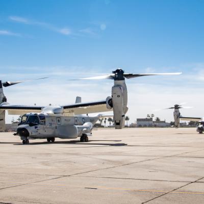 CMV-22B Ospreys, attached to Fleet Logistics Multi-Mission Squadron (VRM) 30, taxi on an airfield runway on Naval Air Station North Island, California.