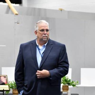 man in suit speaking