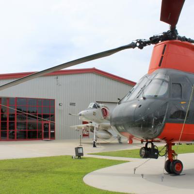 HH-46 helicopter in front of tourist center