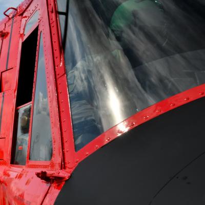 Pilot flies UH-1N helicopter for functional check flight