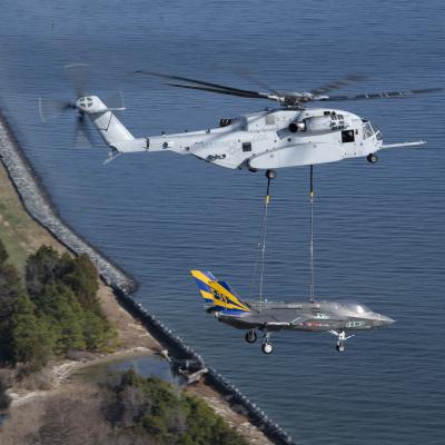 A non-flyable F-35C Lightning II airframe is flown as part of a CH-53K King Stallion external load certification lift Dec. 13, 2022, at Naval Air Station Patuxent River, Md.