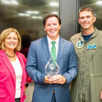 2022 PSM of the Year Matt Cosgrove stands with PMA-290 PM and PDPM after the award ceremony