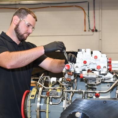 Steven Murray, an aircraft engine mechanic at Fleet Readiness Center East (FRCE), begins disassembly of a lift fan clutch for the F-35B Lightning II aircraft. FRCE personnel became the first within the Department of Defense (DoD) to perform a successful assembly of this component outside of Rolls Royce’s LiftWorks facility in Indianapolis. 