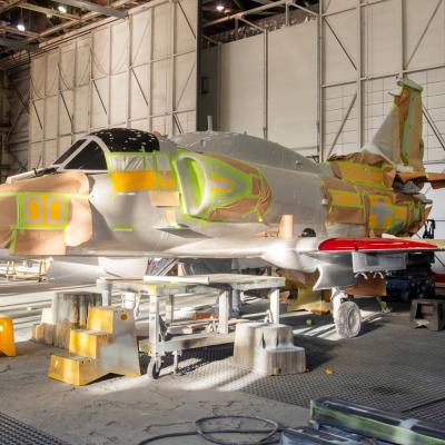 Side view of the aircraft with tape and stencils stuck to it 