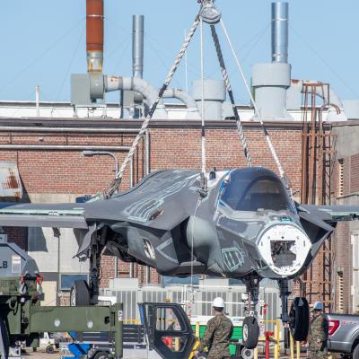 Marines use crane to lift decommissioned F-35 airframe