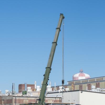 Marines use crane to lift decommissioned F-35 airframe