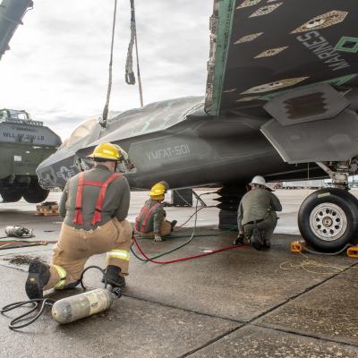 Marines use crane to lift decommissioned F-35 airframe