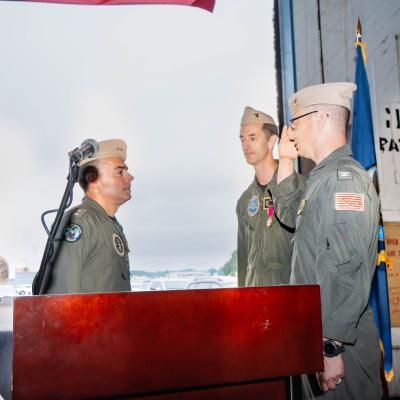 Rear Adm. John Lemmon, Capt. Jonathan Schiffelbein and Capt. Kevin McGee