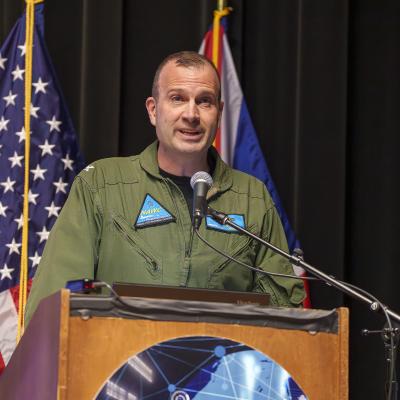 Capt. Jon Rugg, vice commander of Naval Air Warfare Center Weapons Division, delivers opening remarks at Naval Base Ventura County Point Mugu, March 10, 2026. 