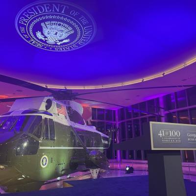 Presidential Helicopter Sits in a Museum with a sign that reads 41@100 for the 41st President's 100th Birthday