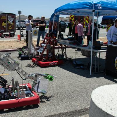 A FIRST Robotics participant pilots his team’s robot creation during the 2019 Point Mugu Command Thank You event. (U.S. Navy photo by Kimberly Brown)