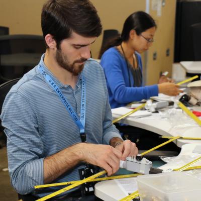 Phillip Porter assembles a made-from-scratch Yagi antenna during a two-day “Fox Hunt” class  hosted June 11-12 by Naval Air Warfare Center Weapons Division in Point Mugu, California.