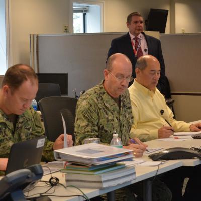 AOG team look over documents