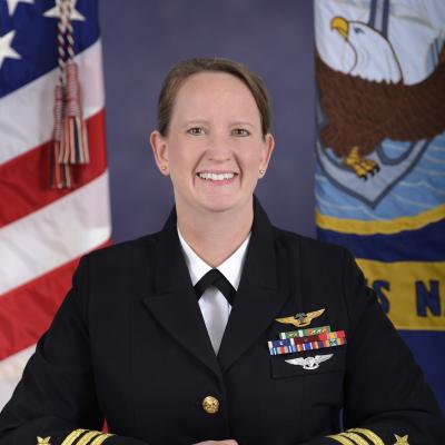 Naval officer in blue dress uniform