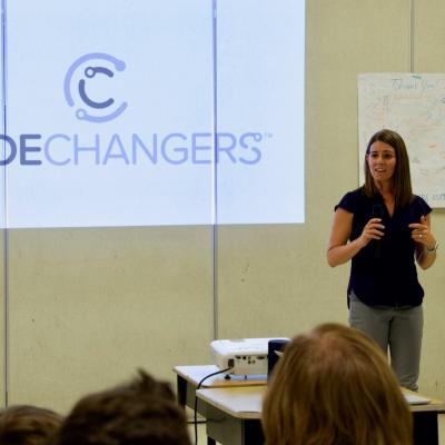 Meghan Baronowski, head of Air Vehicle Engineering at Naval Air Warfare Center Weapons Division, speaks to parents and their students who participated in a four-day coding camp in Ridgecrest, California on June 3-6. (U.S. Navy photo by Paul Kakert)