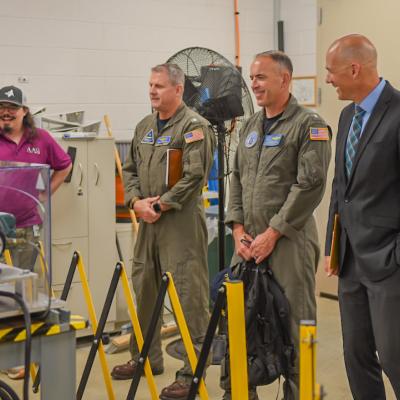 Guests tour a lab at NAWCAD Lakehurst