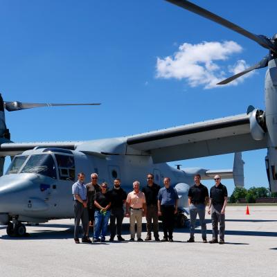Members of the Cone Drive team pose with the MV-22 during a static display