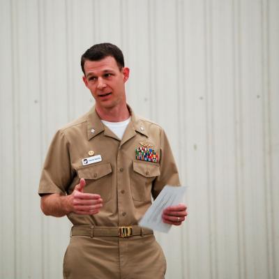 Cmdr. Daniel P. Martin, the new commanding officer of Air Test and Evaluation Squadron (UX) 24 "Ghost Wolves," offers remarks during Friday's change of command ceremony at Naval Air Station Patuxent River Webster Outlying Field. Martin assumed command from Capt. (sel) Matthew A. Densing, who served as the squadron’s first commanding officer upon its establishment in 2018.