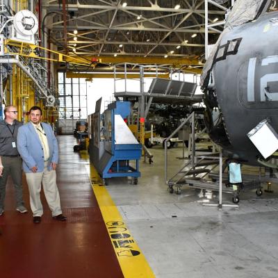 Group surveys H-53 aircraft production line in hangar space
