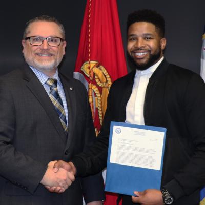 Dominic Priestley, right, NAVAIR’s Mentor of the Year in Point Mugu, California, poses with Tom Dowd, NAVAIR Ranges Director, after a Jan. 31 ceremony honoring mentors from across NAVAIR. (U.S. Navy photo)