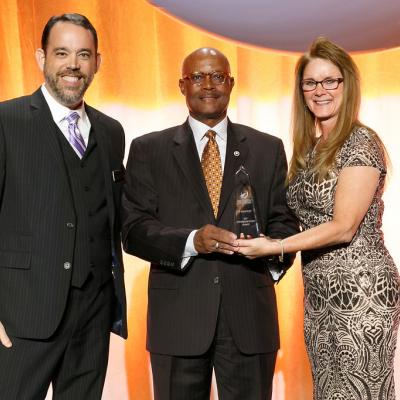 Dr. Ron Smiley receives the Association of Old Crows’ Technology Hall of Fame award during a ceremony Nov. 29, 2017, in Washington, D.C. Smiley was a driving force behind the annual Electronic Warfare symposium jointly hosted by the AOC and Naval Air Warfare Center Weapons Division in Point Mugu, California. 