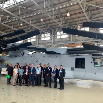 Participants from the NAVAIR Leadership Development Program 2020 cohort shown in the MV-22 Osprey hanger at Fleet Readiness Center Southwest, Naval Air Station North Island