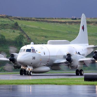 EP-3 Aries takes off from a runway. 
